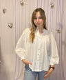Juliette's off white blouse