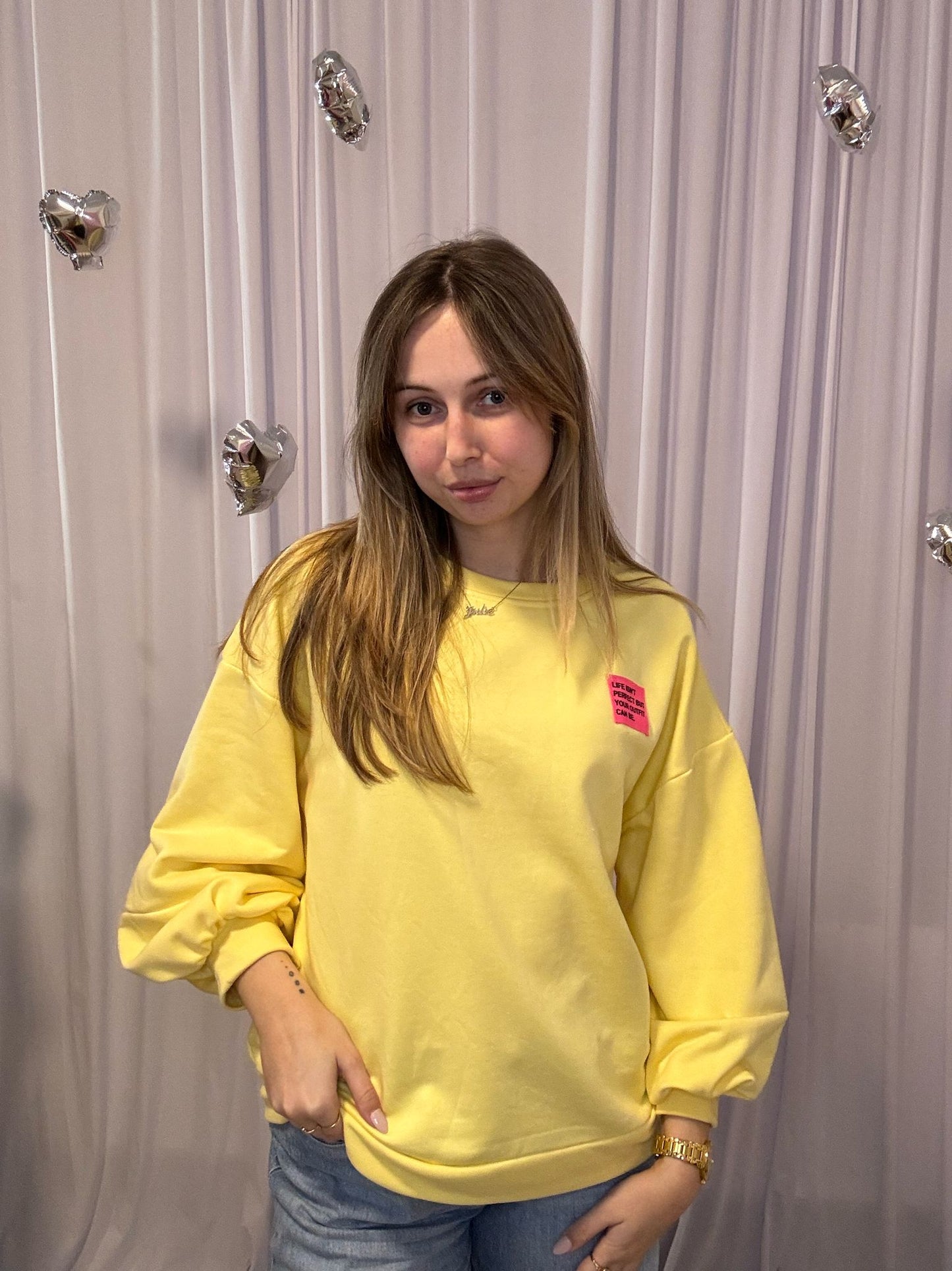 Juliette's yellow sweater