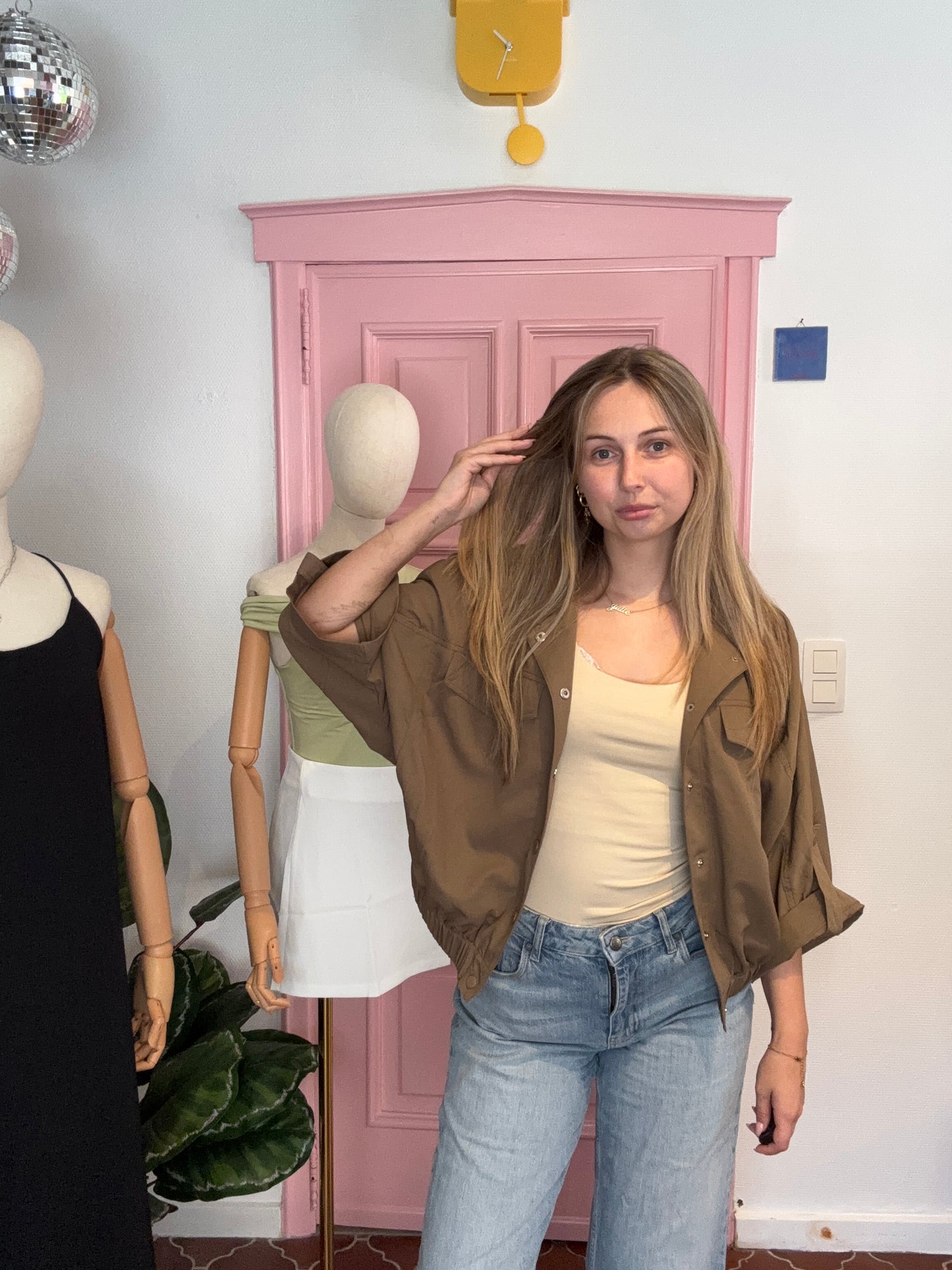 Julia's brown jacket