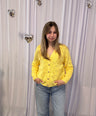Juliette's yellow knitwear
