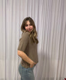 Juliette's bruine lente trui